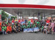 Pertamina Patra Niaga Berbagi di Surabaya: Salurkan Bantuan Pendidikan dan Ganti Oli Gratis untuk Ratusan Driver Ojol